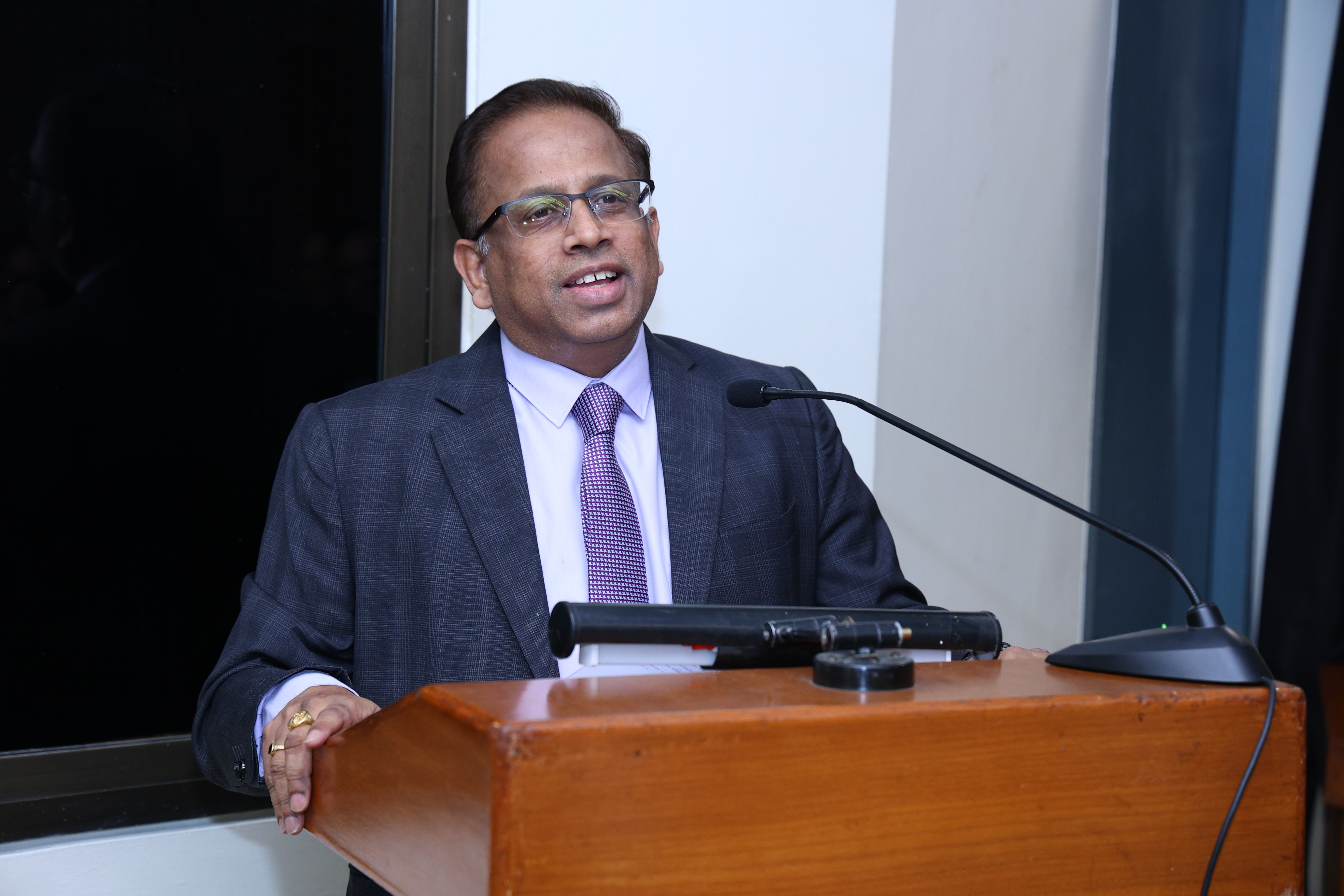 A closer portrait of Justice K.V. Vishwanathan during the keynote