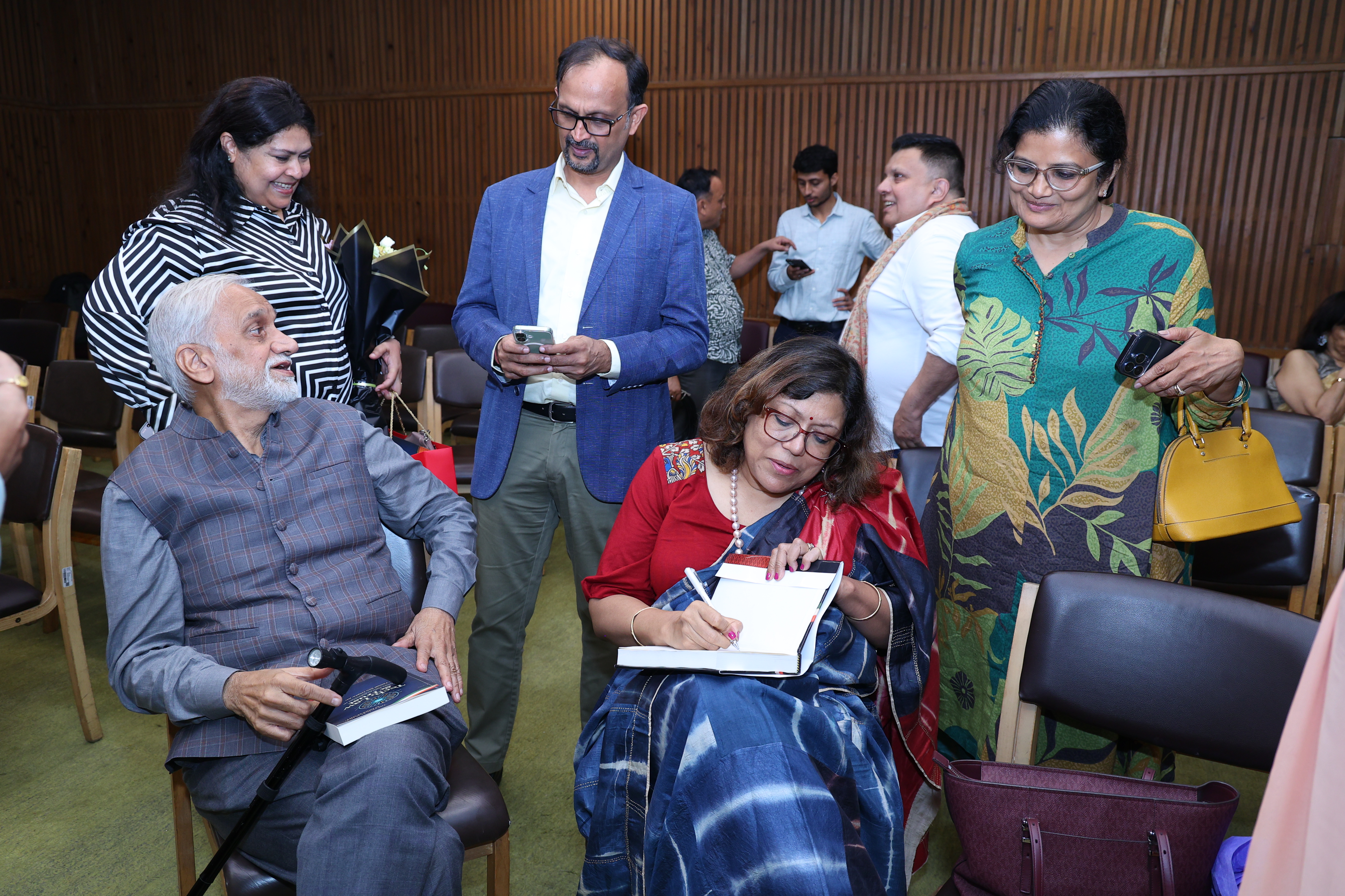 Dr. Tamali Sen Gupta signing copies after the event